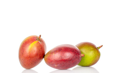 Ripe juicy mangoes on a white background, close-up.