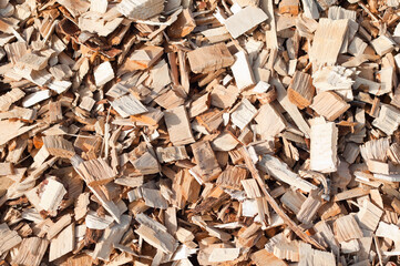 The photo shows a close-up of wood chips
