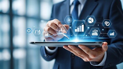Businessman analyzing business data with a futuristic digital interface on a tablet