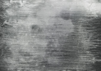 Brushed metal texture creating a stunning industrial background.Aluminum surface provides a textured and industrial backdrop, perfect for design projects seeking a raw and metallic aesthetic