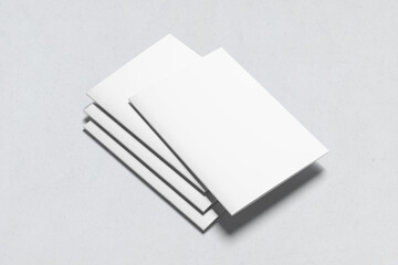 Four blank A4 or A5 magazine brochure mockups presented on a white background. 3D rendering