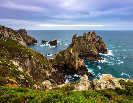 Coastal cliffs and archway - Powered by Adobe