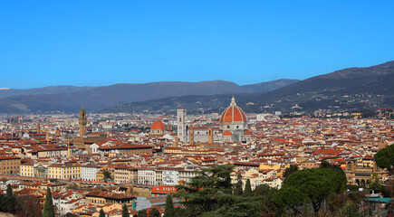 Wide View of City Florence in Central Italy  with famous landmarks and very vivid colors and Italian Apennines Mountains