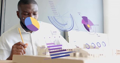 Designer examining design model holding pencil while data charts fading and guiding model edits - Powered by Adobe