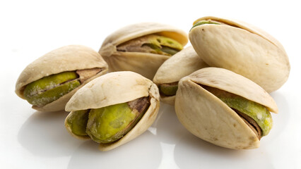 Close-Up of Open Pistachio Nuts on White Background