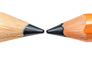 Two sharpened pencils meeting tip to tip isolated on transparent background. Two pencils facing each other isolated on white background.