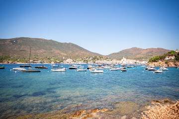 Obraz premium View of the sea and boats in Cadaques, Spain. Beautiful coastal landscape in Costa Brava