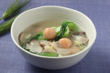 King oyster mushroom ball soup with green vegetables. Created by master chef Hanshunseop.
