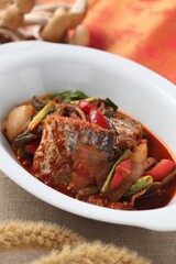 Healthy braised hairtail fish with velvet shank mushrooms and vegetables. A work by Master Chef Hanshunseop. Photographed in Korea.