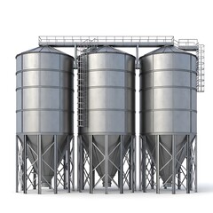 Three stainless steel grain storage silos.