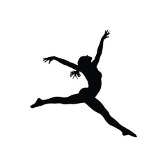 Fototapeta premium Silhouette of a female dancer leaping with arms outstretched in a dynamic pose
