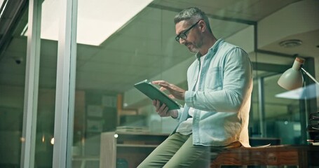 Business, tablet and man with window, night and research for news report, email and creative. Mature person, journalist and employee with connection, tech or evening with network, view and typing - Powered by Adobe