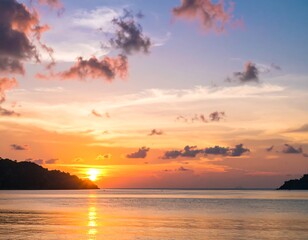 Obraz premium Colorful sunset over calm ocean