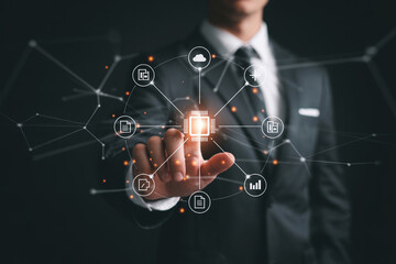 Businessman touching virtual screen with digital icons representing cloud computing data analysis and network security for modern innovative business solutions