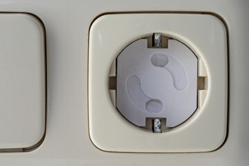child safety lock with rotating mechanism in wall socket