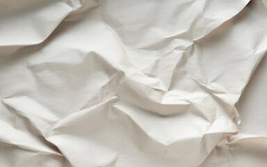 Close-up of crumpled off-white paper texture background