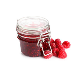Sweet raspberry jam in glass jar and berries isolated on white