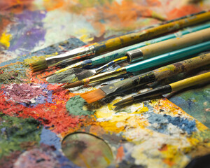 Fototapeta premium Artist Brushes on Colorful Palette