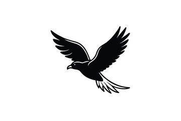 Fototapeta premium A striking black silhouette of a majestic hawk in mid flight wings spread wide captured against a clean white background symbolizing freedom and power silhouette