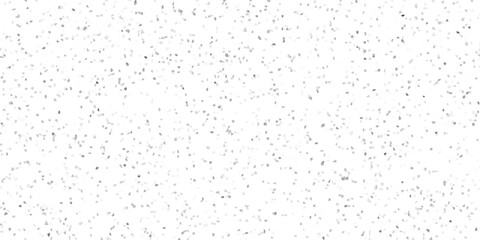 Abstract mosaic pattern in shades of gray creating a textured surface with a random scattered effect on a white background
