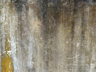Old damaged grunge wall with rust stains on concrete surface for vintage industrial design. Wall texture.