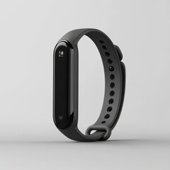 Gray fitness tracker with silicone band.