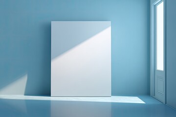 Obraz premium Blank canvas in a light-blue room. Sunlight casts shadows