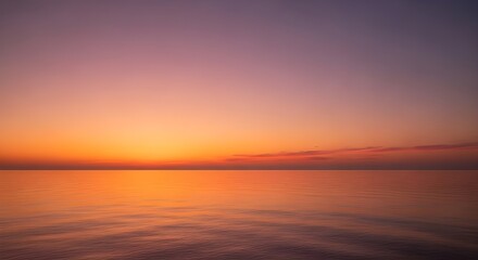 Obraz premium Serene Ocean Sunset Background with Warm Gradient