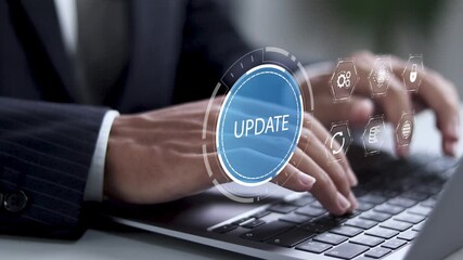 Software update or operating system upgrade concept. Improved functionality in the new version and improved security. Businessman using laptop with Software update and upgrade technology. - Powered by Adobe
