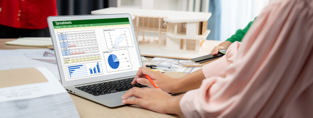 Spreadsheet document information financial startup concept. data and graphs in spreadsheet...