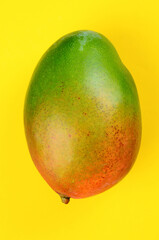 Mango on a bright yellow background