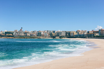 bay of a coruna northern spain with furious big waves ocean waters blue day