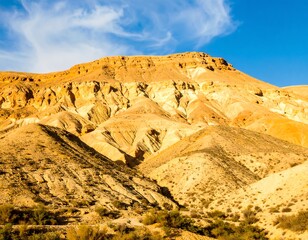 Dramatic desert mountain range under a vibrant sky