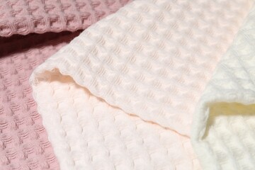 Clean waffle towels as background, closeup view