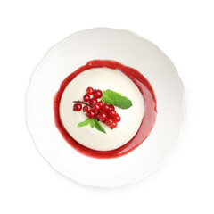Delicious panna cotta with red currants, sauce and mint isolated on white, top view