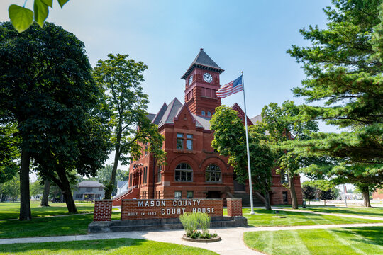 Mason County Courthouse Exterior with Sign and Flag in Ludington, Michigan
