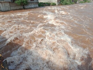 flood water after heavy rain in the stream 