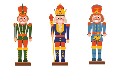 Set of three Christmas nutcracker toy soldiers in red, green and blue uniforms.