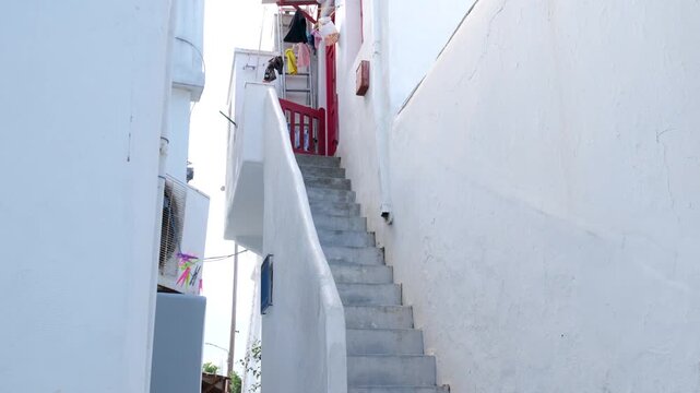 Experience Mykonos Greece stunning, with iconic white buildings and domes against the beautiful Aegean Sea, making its perfect destination for lovers of scenic beauty and exploration.