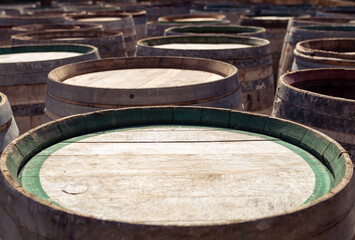 Fototapeta premium Barrels of wine in wood. Texture