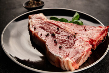 Raw steak T-bone fresh meat premium beef snack fresh delicious gourmet food background on the table rustic food top view copy space