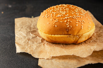 Bun burger puffy soft buns baking fresh delicious gourmet food background on the table rustic food top view copy space
