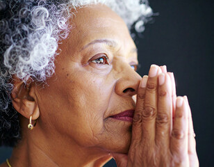 Thoughtful Elderly Woman in Quiet Reflection With Hands Resting Gracefully