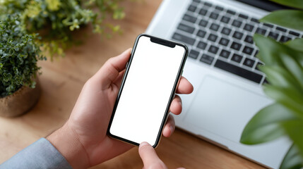 Businessperson Using Smartphone with Blank Screen in Office Setting