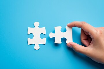 Solving jigsaw puzzle concept, business strategy, hand connecting puzzle pieces idea