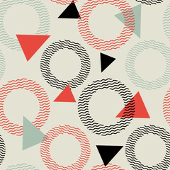 Seamless pattern with wavy circles and solid triangles in black, red, and light green on a beige background. A modern geometric design with bold contrast and visual harmony.