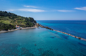 Fototapeta premium Aerial drone view with Agios Nikolaos chapel in Meliteieis region of Cordu Island, Greece