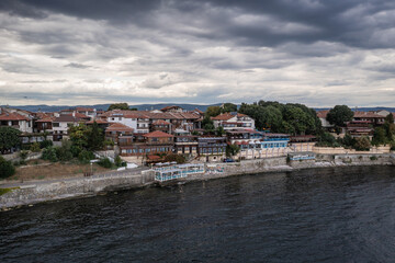 Fototapeta premium Buildings over Black Sea in Nesebar historic city in Bulgaria