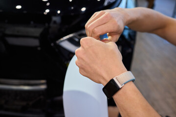 Applying a Protective Film on the Surface of Your Car for Enhanced Durability and Shine