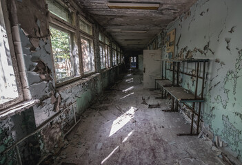 Corridor in Middle School No. 3 in Pripyat ghost city in Chernobyl Exclusion Zone, Ukraine